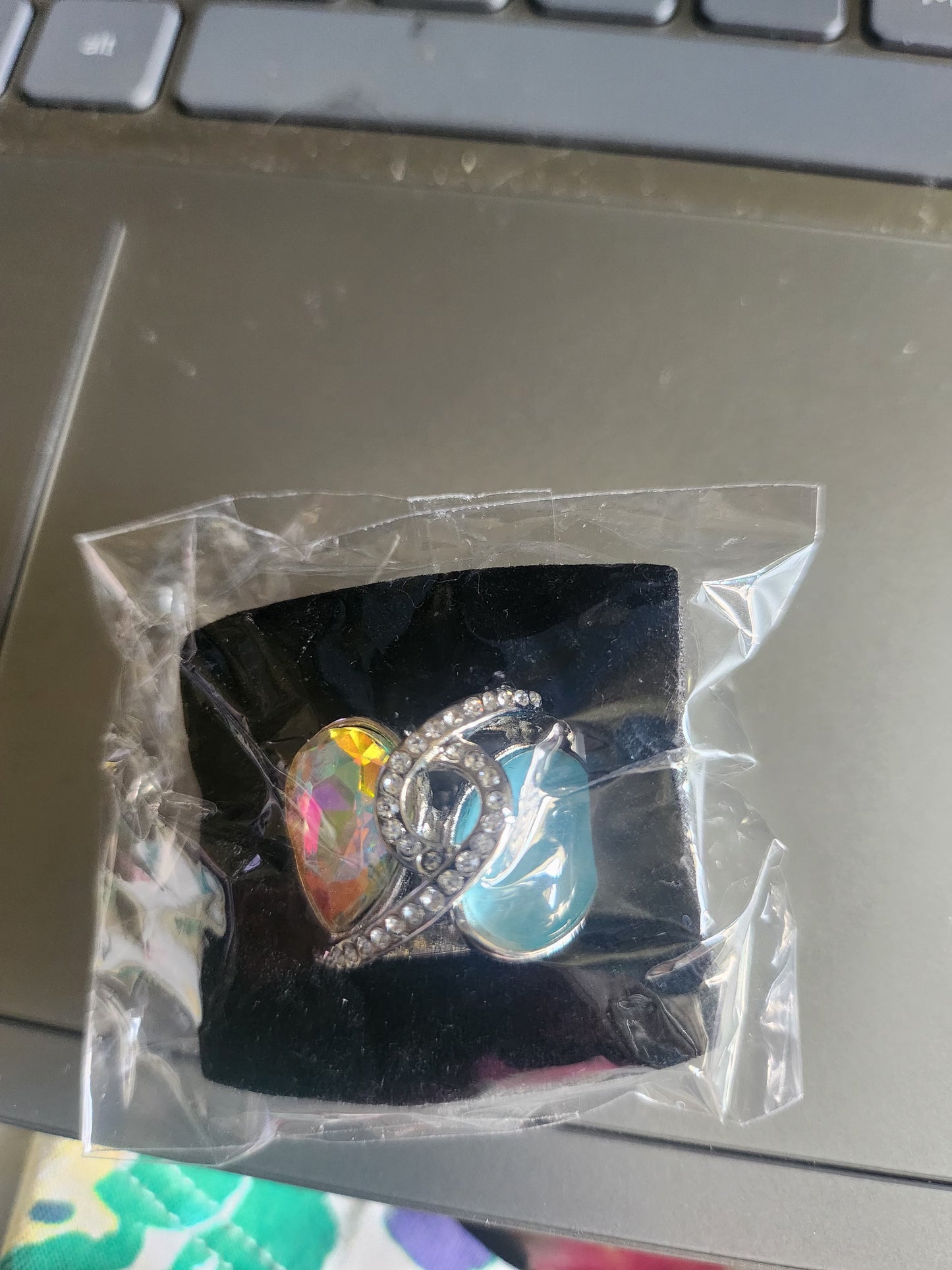 Iridescent necklace + ring