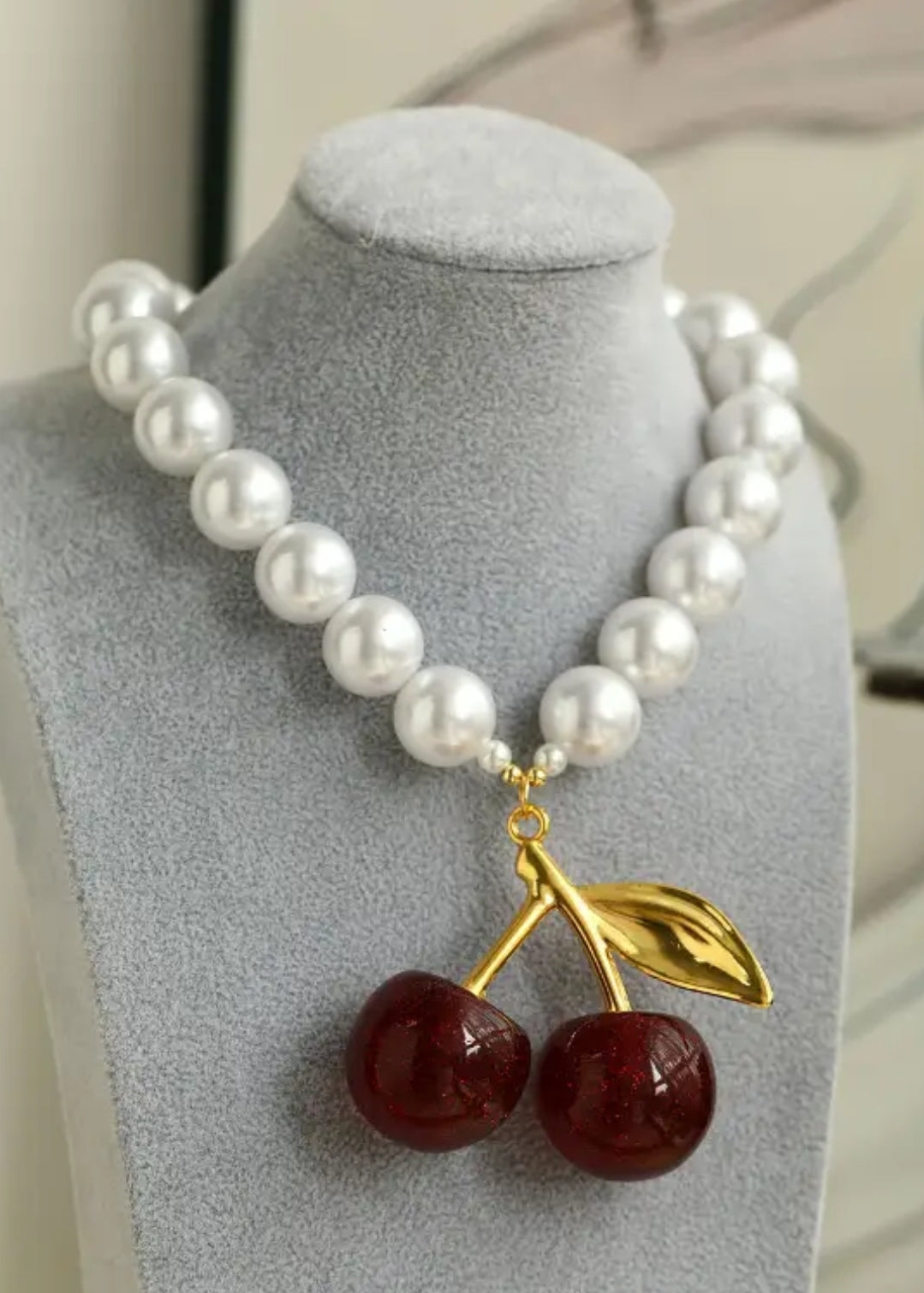 Pearl with cherry pendant