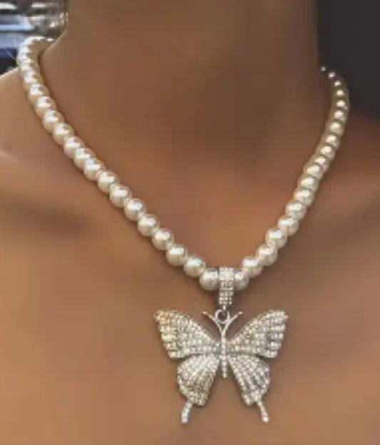 Pearl necklace with silver butterfly pendant