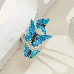Triple butterfly ring