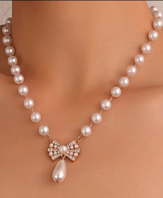 PEARL NECKLACE WITH OLD RHINESTONE BOW